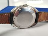 a close up of a watch on a table