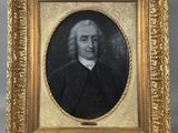 le portrait d'un homme dans un cadre doré