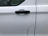 a close up of a car door handle on the side of the car