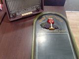 an old radio sitting on a table next to an old radio