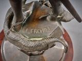 a statue of a snake on top of a table