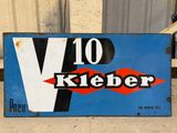 a blue sign that says v 10 kickerer on the side of a building