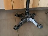a black table with a clock on top of it