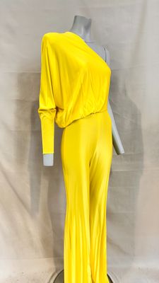 a mannequin wearing a yellow jumpsuit on a mannequin mannequin mannequin mann