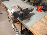 an image of a vise on a workbench in a workshop