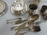 a table with silverware and silverware on it
