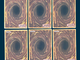 four square coasters with a picture of a black hole in the middle of them