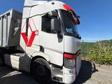 a truck that is parked on the side of the road