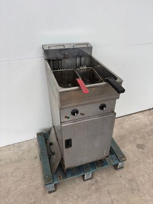 an image of a commercial fryer sitting on a pallet