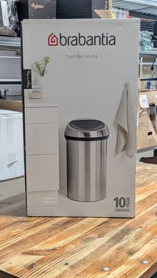 une boîte de poubelles Brabantia posée sur une table