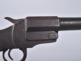 a close up of a gun on a white background