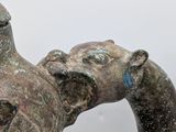 statue of a woman holding a baby in her arms