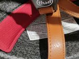 a close up of a seat belt on a child ' s car seat