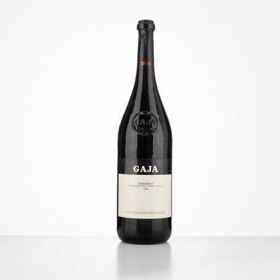 a close up of a bottle of wine on a table