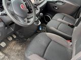 the interior of a car with a steering wheel and a dashboard