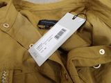a label on the back of a jacket that has a barcode on it