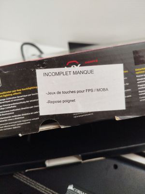 a box with a label on it sitting on top of a desk