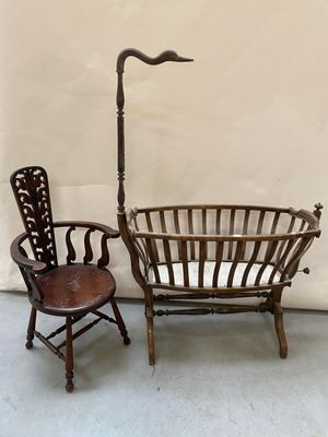 two chairs and a chair with a bird on it in a room