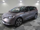 the new renault grand tourer in a showroom with a checkered floor