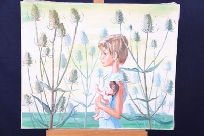 un tableau représentant une femme tenant un bébé, posé sur un chevalet
