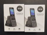 two boxes of phones sitting on a table