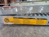 a box with a yellow label on it sitting on the floor