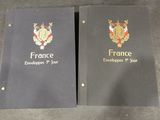 two black folders with the emblem of france and the emblem of france on them