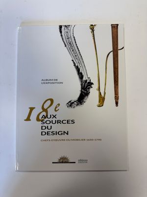 an image of a book with a picture of a shoe and a pen
