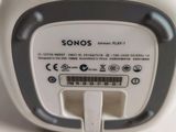 a close up of a white and black device on a table