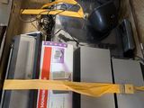 a piece of luggage that has a bunch of electronics inside of it