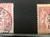 deux timbres avec la photo d'un homme et d'une femme
