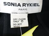 a close up of a label on a black jacket
