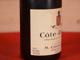 a bottle of wine that is sitting on a table