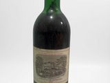 a bottle of wine that is sitting on a table