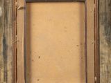 a painting of a wooden frame with a label on it