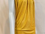 the mannequin is wearing a yellow dress with a halt