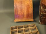 two wooden boxes that are sitting on a table