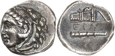 a silver coin with an image of a man on it