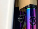 a bike with a purple handlebar and a blue handlebar