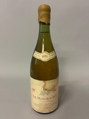 a bottle of wine that is sitting on a table