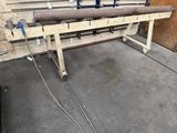 an image of a workbench in a garage with a lot of tools