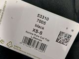 a label on the back of a jacket that says black