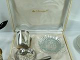 a silverware set in a wooden box on a table