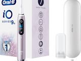 a toothbrush that is sitting next to a box of toothpaste