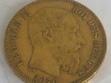 a gold coin with a picture of a man on it