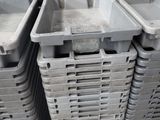 several plastic containers stacked on top of each other on a pallet