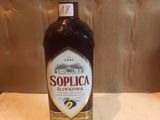a bottle of liquor sitting on a counter top