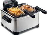 an image of a deep fryer with french fries in it