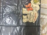 a black wallet with a picture of a teddy bear on it