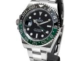 rolex watch with green bezel and black bezel bezel